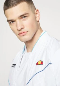 Ellesse Mirabeau - Giacca Sportiva - White -Ellesse 60ba383bac07461589625f595ed1499a