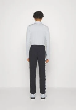 Ellesse Davico Track PantPantaloni SportiviBlack Uomo Pantaloni Sportivi E Joggers EL942E04N-Q11 -Ellesse b0b8754f685d4ec3b8adec70a0929200