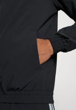 Ellesse Main Track - Giacca Sportiva - Black/Multi -Ellesse fc82ee542caa47848f42c0c1f25ce47e